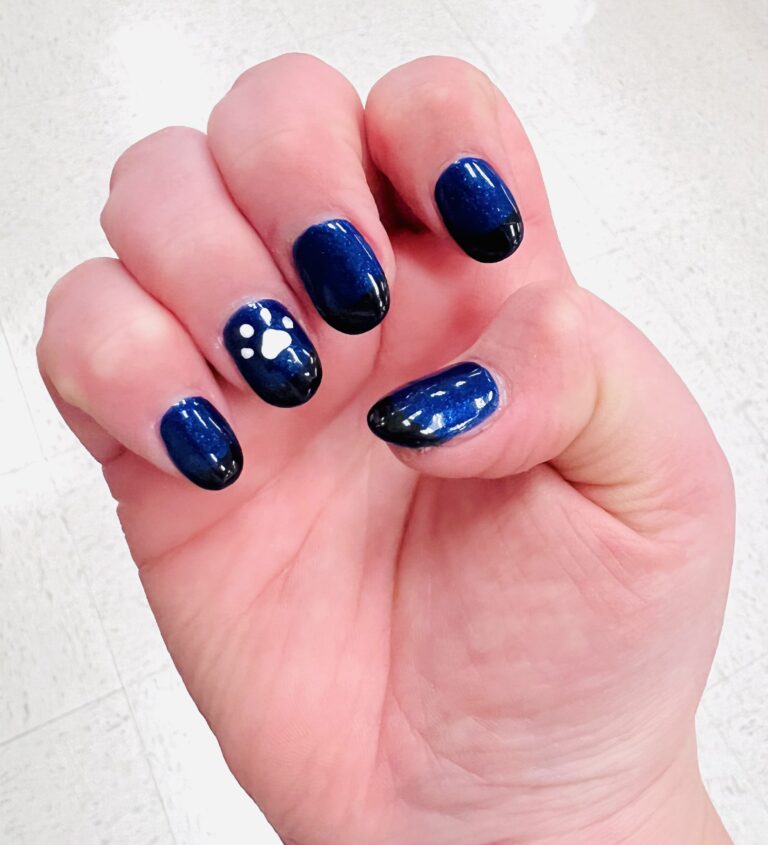glittery blue nails with black tips and a paw print on the ring fingernail | uplevel your customer service - Busy Life Healthy Wife